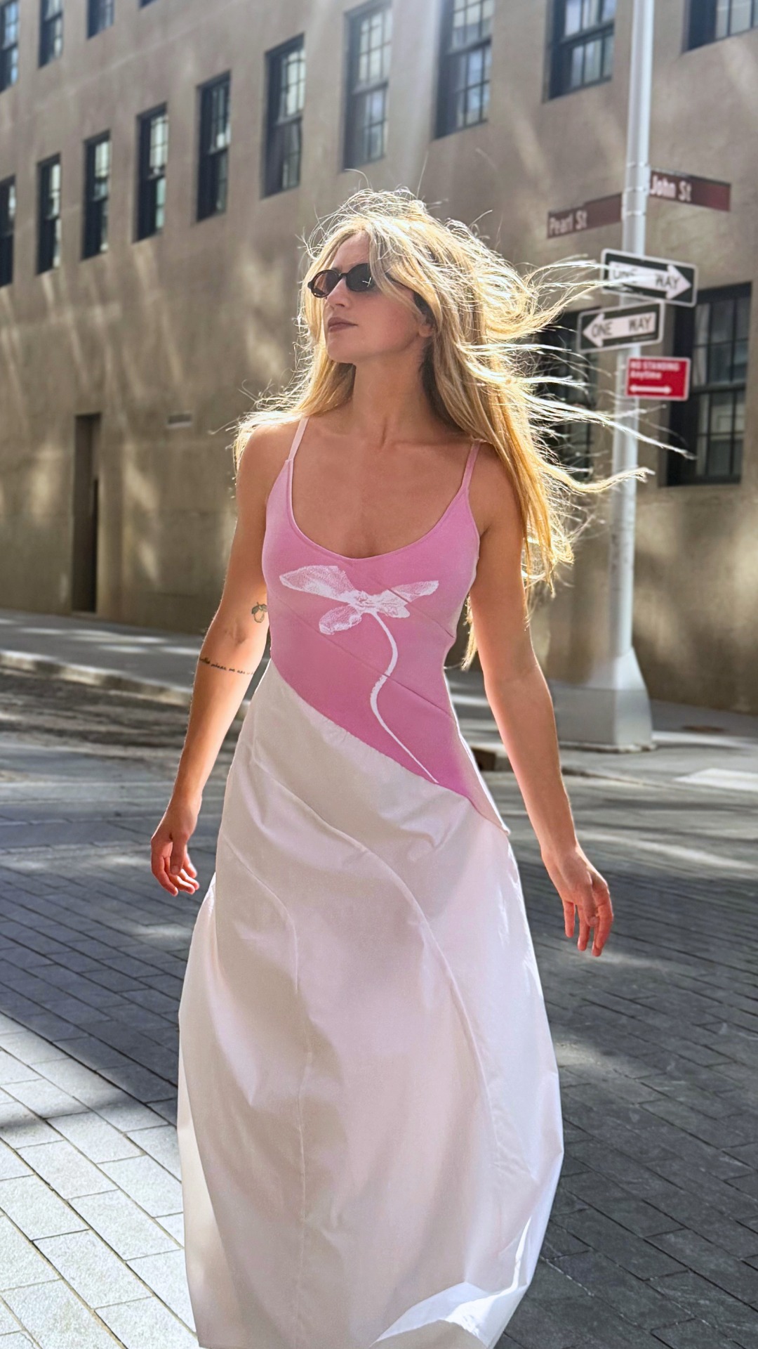 This dress has a secret. Step into the sun and watch it show you.