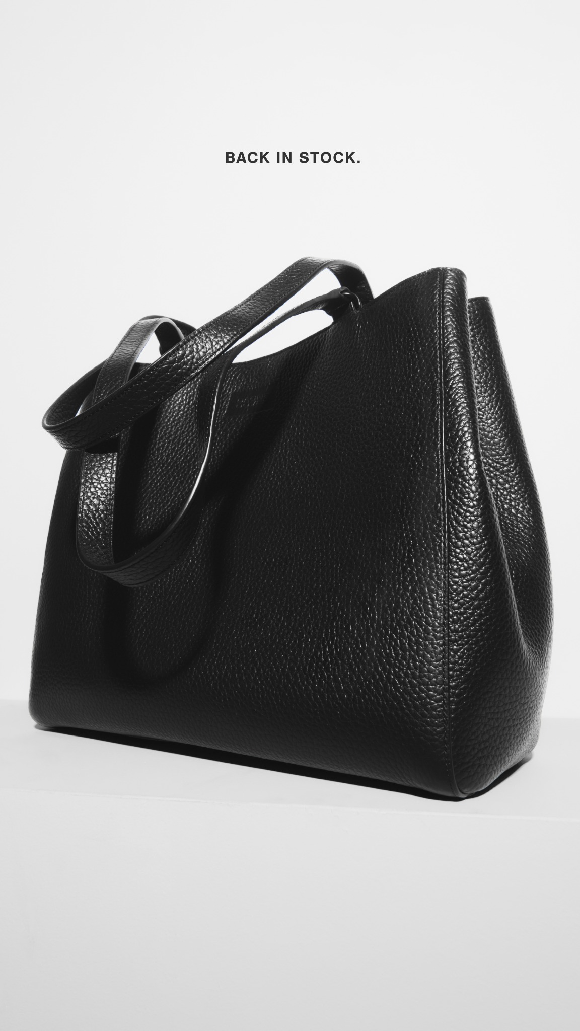 Thousands waitlisted. The perfect leather tote is back.