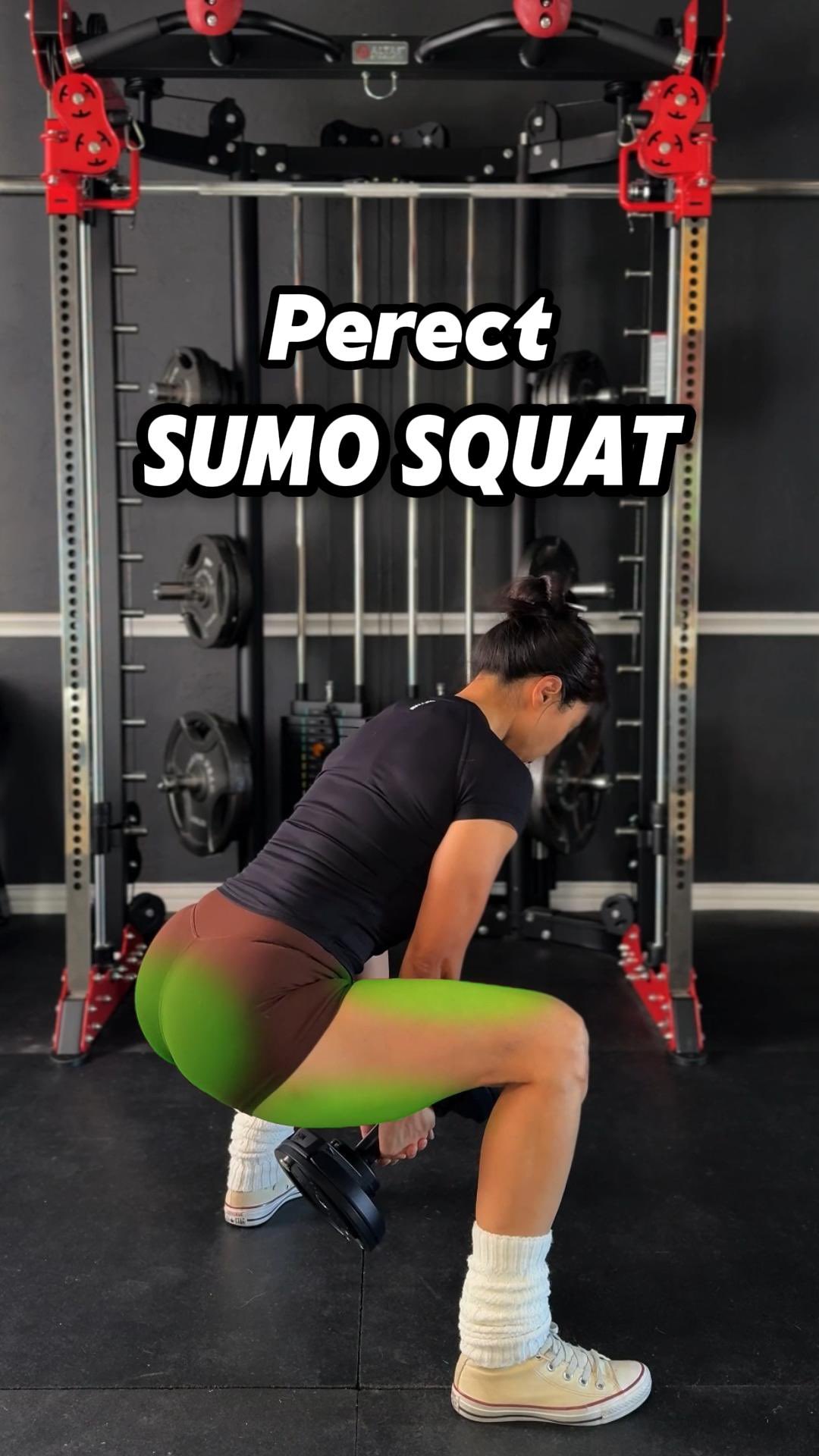 Dumbbell Sumo Squat - How to Target the Glutes
App from fitbodapp 

1. Dumbbell Position
Hold the dumbbell with both hands naturally hanging between your legs, rather than holding it at your chest.
This allows you to lif