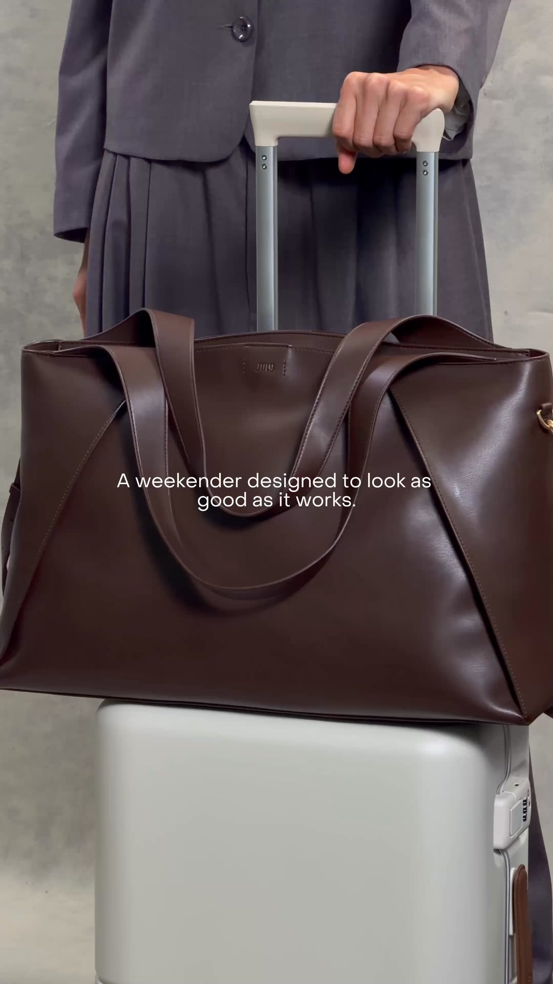 New addition to the family. The Soft Weekender is your spacious escape bag with Juliette's signature sculptural design. Luggage strap, crossbody option, organized pockets throughout. Structured enough to stand upright, s